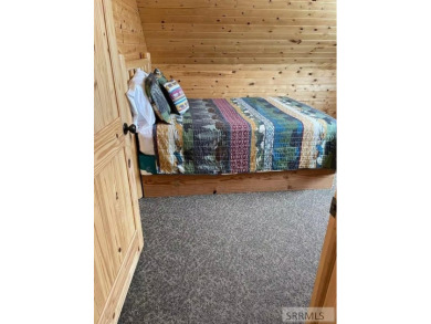 Beautiful cabin in the Island Park Village subdivision! Near the on Island Park Village Resort Golf Course in Idaho - for sale on GolfHomes.com, golf home, golf lot