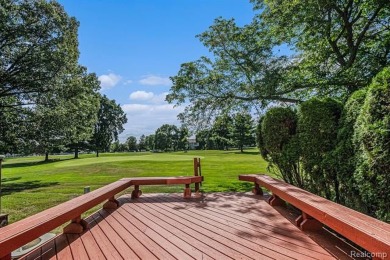 Welcome to your new home on the scenic 9th hole of Lake O' the on Lake O The Hills Golf Course in Michigan - for sale on GolfHomes.com, golf home, golf lot