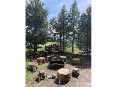 Beautiful cabin in the Island Park Village subdivision! Near the on Island Park Village Resort Golf Course in Idaho - for sale on GolfHomes.com, golf home, golf lot