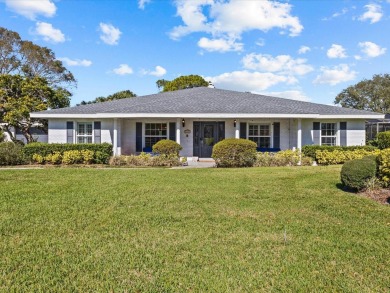 Step into luxury with this stunning ranch-style home in the on Cypresswood Golf and Country Club in Florida - for sale on GolfHomes.com, golf home, golf lot