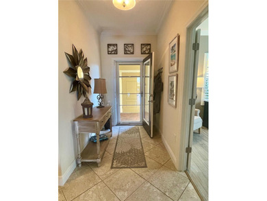 Step into effortless Florida living with this pristine, turnkey on Boca Royale Golf and Country Club in Florida - for sale on GolfHomes.com, golf home, golf lot