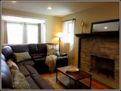 Completely renovated in 2020 this year round home sits on the on Lake Lackawanna Golf Course in New Jersey - for sale on GolfHomes.com, golf home, golf lot