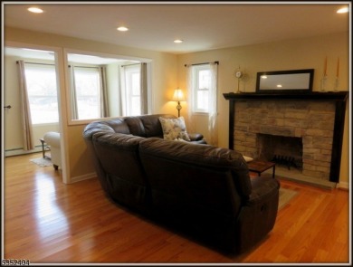 Completely renovated in 2020 this year round home sits on the on Lake Lackawanna Golf Course in New Jersey - for sale on GolfHomes.com, golf home, golf lot