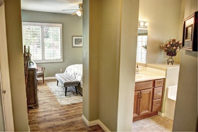 An immaculate home with 2 primary suites plus a powder room in on Indian Palms Country Club and Resort in California - for sale on GolfHomes.com, golf home, golf lot