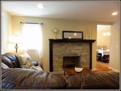 Completely renovated in 2020 this year round home sits on the on Lake Lackawanna Golf Course in New Jersey - for sale on GolfHomes.com, golf home, golf lot