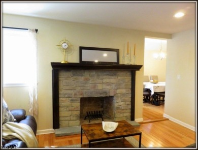 Completely renovated in 2020 this year round home sits on the on Lake Lackawanna Golf Course in New Jersey - for sale on GolfHomes.com, golf home, golf lot