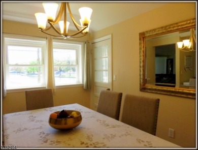 Completely renovated in 2020 this year round home sits on the on Lake Lackawanna Golf Course in New Jersey - for sale on GolfHomes.com, golf home, golf lot