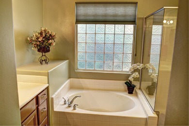 An immaculate home with 2 primary suites plus a powder room in on Indian Palms Country Club and Resort in California - for sale on GolfHomes.com, golf home, golf lot