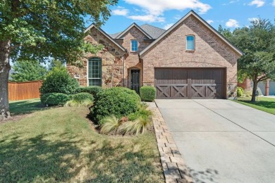Tucked away on a peaceful cul-de-sac in Lantana, this charming on Lantana Golf Club in Texas - for sale on GolfHomes.com, golf home, golf lot