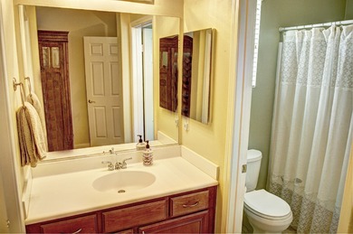 An immaculate home with 2 primary suites plus a powder room in on Indian Palms Country Club and Resort in California - for sale on GolfHomes.com, golf home, golf lot