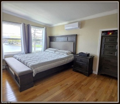 Completely renovated in 2020 this year round home sits on the on Lake Lackawanna Golf Course in New Jersey - for sale on GolfHomes.com, golf home, golf lot