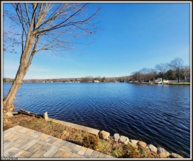 Completely renovated in 2020 this year round home sits on the on Lake Lackawanna Golf Course in New Jersey - for sale on GolfHomes.com, golf home, golf lot