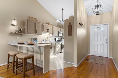 This beautifully updated end-unit condo offers effortless on Holly Tree Country Club in South Carolina - for sale on GolfHomes.com, golf home, golf lot