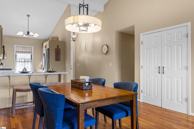 This beautifully updated end-unit condo offers effortless on Holly Tree Country Club in South Carolina - for sale on GolfHomes.com, golf home, golf lot