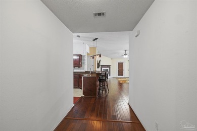 Welcome to this well-maintained 3-bedroom, 2-bathroom home on Marcus Pointe Golf Club in Florida - for sale on GolfHomes.com, golf home, golf lot