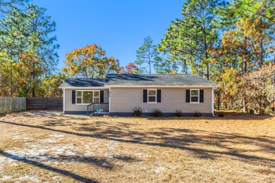 Welcome to this charming 3 bedroom, 2 bath one story ranch home on The Lakes Country Club in North Carolina - for sale on GolfHomes.com, golf home, golf lot