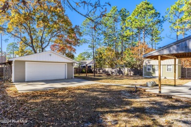 Welcome to this charming 3 bedroom, 2 bath one story ranch home on The Lakes Country Club in North Carolina - for sale on GolfHomes.com, golf home, golf lot