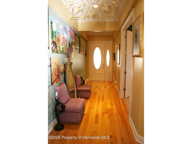 One or more photo(s) has been virtually staged. Nestled on a on Southern Hills Plantation Club in Florida - for sale on GolfHomes.com, golf home, golf lot