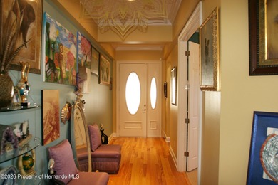 One or more photo(s) has been virtually staged. Nestled on a on Southern Hills Plantation Club in Florida - for sale on GolfHomes.com, golf home, golf lot