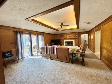 Situated in the heart of Rayburn Country, this elegant golf on Rayburn Country Club in Texas - for sale on GolfHomes.com, golf home, golf lot