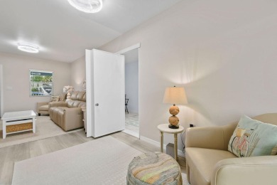 Discover resort-style living on the scenic shores of Lake on Blue Cypress Golf and RV Resort in Florida - for sale on GolfHomes.com, golf home, golf lot