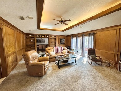 Situated in the heart of Rayburn Country, this elegant golf on Rayburn Country Club in Texas - for sale on GolfHomes.com, golf home, golf lot