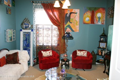 One or more photo(s) has been virtually staged. Nestled on a on Southern Hills Plantation Club in Florida - for sale on GolfHomes.com, golf home, golf lot