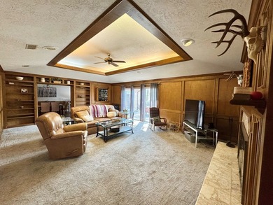 Situated in the heart of Rayburn Country, this elegant golf on Rayburn Country Club in Texas - for sale on GolfHomes.com, golf home, golf lot