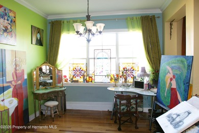 One or more photo(s) has been virtually staged. Nestled on a on Southern Hills Plantation Club in Florida - for sale on GolfHomes.com, golf home, golf lot