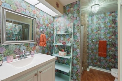 Head inside to discover an open-concept you'll love. With warm on Greenbrier Country Club in Virginia - for sale on GolfHomes.com, golf home, golf lot