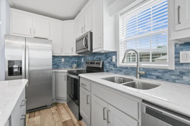 Discover resort-style living on the scenic shores of Lake on Blue Cypress Golf and RV Resort in Florida - for sale on GolfHomes.com, golf home, golf lot