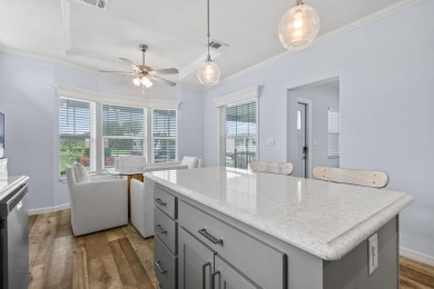 Discover resort-style living on the scenic shores of Lake on Blue Cypress Golf and RV Resort in Florida - for sale on GolfHomes.com, golf home, golf lot