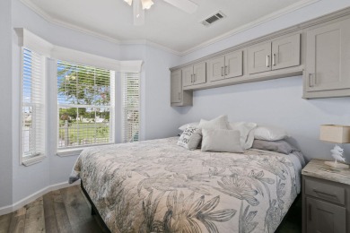 Discover resort-style living on the scenic shores of Lake on Blue Cypress Golf and RV Resort in Florida - for sale on GolfHomes.com, golf home, golf lot