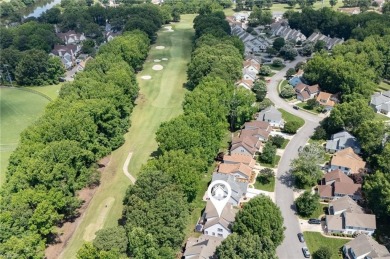 Head inside to discover an open-concept you'll love. With warm on Greenbrier Country Club in Virginia - for sale on GolfHomes.com, golf home, golf lot