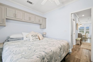 Discover resort-style living on the scenic shores of Lake on Blue Cypress Golf and RV Resort in Florida - for sale on GolfHomes.com, golf home, golf lot