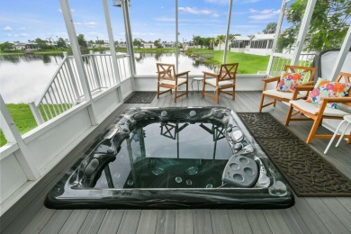 Discover resort-style living on the scenic shores of Lake on Blue Cypress Golf and RV Resort in Florida - for sale on GolfHomes.com, golf home, golf lot