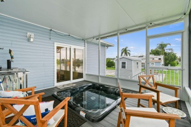 Discover resort-style living on the scenic shores of Lake on Blue Cypress Golf and RV Resort in Florida - for sale on GolfHomes.com, golf home, golf lot