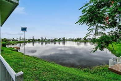 Discover resort-style living on the scenic shores of Lake on Blue Cypress Golf and RV Resort in Florida - for sale on GolfHomes.com, golf home, golf lot