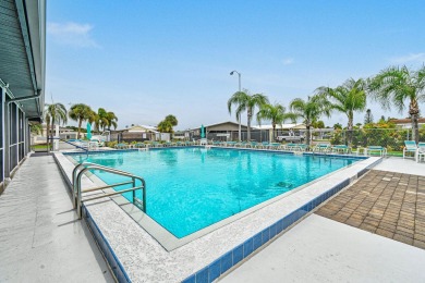Discover resort-style living on the scenic shores of Lake on Blue Cypress Golf and RV Resort in Florida - for sale on GolfHomes.com, golf home, golf lot