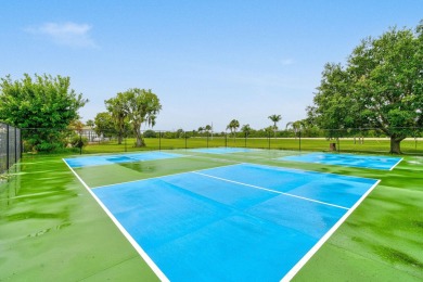 Discover resort-style living on the scenic shores of Lake on Blue Cypress Golf and RV Resort in Florida - for sale on GolfHomes.com, golf home, golf lot