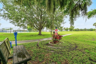 Discover resort-style living on the scenic shores of Lake on Blue Cypress Golf and RV Resort in Florida - for sale on GolfHomes.com, golf home, golf lot