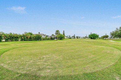 Discover resort-style living on the scenic shores of Lake on Blue Cypress Golf and RV Resort in Florida - for sale on GolfHomes.com, golf home, golf lot
