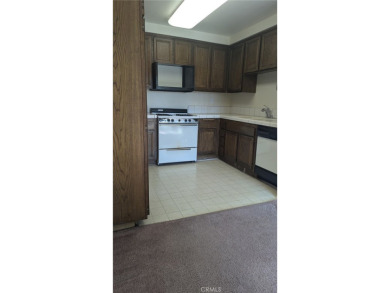 Amazing Location on this Move in ready townhome that sits across on Vista Valencia Golf Course in California - for sale on GolfHomes.com, golf home, golf lot
