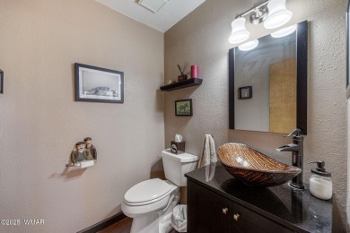Escape to this premium cabin located on the twelfth fairway in on Pinetop Lakes Country Club in Arizona - for sale on GolfHomes.com, golf home, golf lot