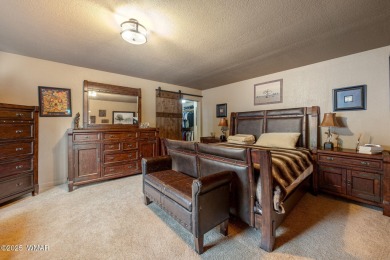 Escape to this premium cabin located on the twelfth fairway in on Pinetop Lakes Country Club in Arizona - for sale on GolfHomes.com, golf home, golf lot