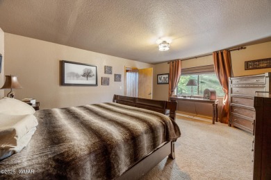 Escape to this premium cabin located on the twelfth fairway in on Pinetop Lakes Country Club in Arizona - for sale on GolfHomes.com, golf home, golf lot