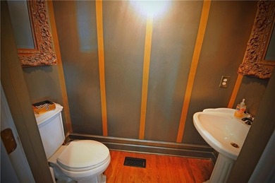 Lakefront Luxury Living! This immaculate open-concept ranch on Fairfield Plantation Golf and Country Club in Georgia - for sale on GolfHomes.com, golf home, golf lot