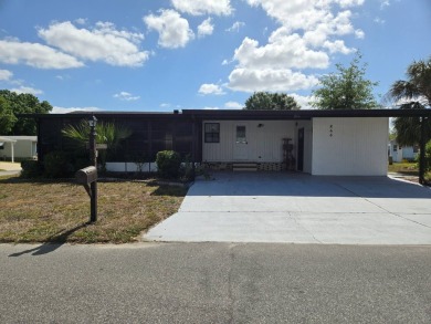 You don't want to miss this 2/1.5 home in Hidden Golf Club a 55+ on Lake Henry Golf Club in Florida - for sale on GolfHomes.com, golf home, golf lot