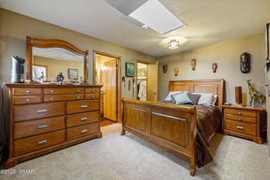 Escape to this premium cabin located on the twelfth fairway in on Pinetop Lakes Country Club in Arizona - for sale on GolfHomes.com, golf home, golf lot