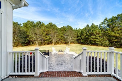 Nestled in the prestigious gated community of River Landing on River Landing Golf Course in North Carolina - for sale on GolfHomes.com, golf home, golf lot